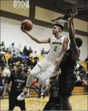  ?? CHRIS RILEY — TIMES-HERALD FILE ?? Bethel's Chance McMillian elevates to the hoop for two of his 32points in the Jaguars' 78-71win over Rodriguez in 2019.