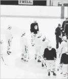  ?? KEVIN MCGRAN TORONTO STAR ?? The Maple Leafs practise for first time in white uniforms with blue and red touches that honour the RCN flag.