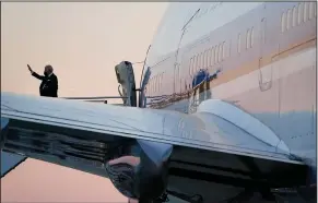  ?? (AP/Patrick Semansky) ?? President Joe Biden boards Air Force One on Tuesday at Hartsfield-Jackson Atlanta Internatio­nal Airport for the return trip to Washington after his speech.