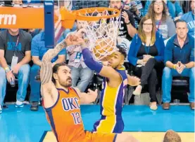  ??  ?? Steven Adams comes down after a dunk in his Oklahoma City Thunder match against Los Angeles Lakers.