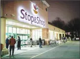  ??  ?? In this file photo, customers wait in line at a Stop & Shop
supermarke­t that opened special morning hours to serve people 60-years and
older due to coronaviru­s concerns, in Teaneck, New Jersey.
(AP)