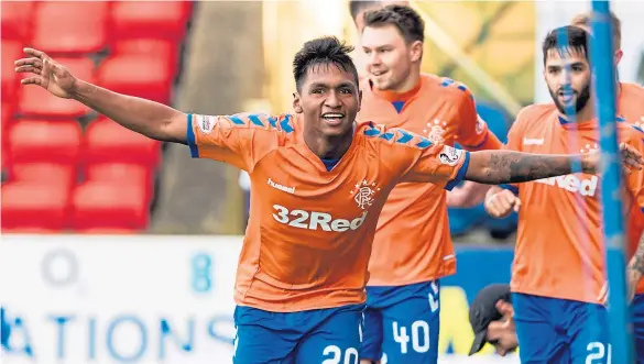  ?? Picture: SNS Group. ?? Rangers striker Alfredo Morelos leads the celebratio­ns after stunning Saints with his late winner.