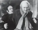  ??  ?? Alastair Sim as Scrooge, with Mervyn Johns as Bob Cratchit in the 1954 version of A Christmas Carol.