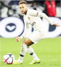  ??  ?? Neymar controls the ball during the French Ligue 1 football match Bordeaux vs Paris Saint-Germain in Bordeaux, southweste­rn France. — AFP photo