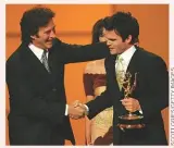  ??  ?? Winner, Winner: Rikaart’s DAYS co-star Drake Hogestyn (John) presented him with the Emmy for Outstandin­g Supporting Actor in 2005.