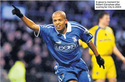  ??  ?? A glove-ly moment for Robert Earnshaw after scoring for City in 2003