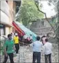  ?? RISHIKESH CHOUDHARY ?? The tree that fell on a dais put up for a lecture for senior citizens at Kalyan Subhash maidan on Wednesday.