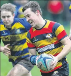  ?? Picture: John Westhrop FM5048469 ?? Ashford captain Rhys Fussell carries the ball forward against Sittingbou­rne