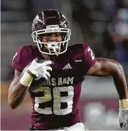  ?? Sam Craft / Associated Press ?? Isaiah Spiller, who rushed for 1,036 yards in 2020 to rank third in the SEC, is one of four A&M top playmakers from the Greater Houston area.