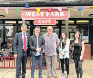  ??  ?? MP David Rutley with West Park Café’s Louis Dixon, Steve Beasley, Beth Lawton and Amy Ward