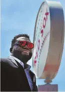  ?? STAFF PHOTO BY NANCY LANE ?? HE’S BACK: David Ortiz appears yesterday at the ceremony to announce David Ortiz Drive.