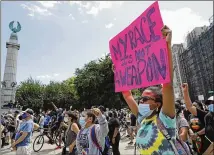  ?? KATHY WILLENS / ASSOCIATED PRESS ?? Protesters gather to listen to speakers, rap artists, faith leaders and others during a Caribbean-led Black Lives Matter rally at Brooklyn’s Grand Army Plaza on Sunday in New York.