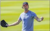  ?? BRYNN ANDERSON — THE ASSOCIATED PRESS ?? Cole Hamels gestures during Braves practice last Sunday in Atlanta.