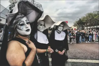  ?? AP PHOTO/RICHARD VOGEL ?? The Sisters of Perpetual Indulgence show their support during the gay pride parade in West Hollywood, Calif., on June 12, 2016.