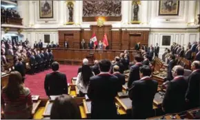  ?? BENAVIDES/AFP ERNESTO ?? Chinese President Xi Jinping (centre) is received at the Peruvian congress for a ceremony in Lima on Monday during an official visit following the APEC summit.