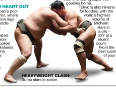  ??  ?? HEAVYWEIGH­T CLASH: Sumo stars in action