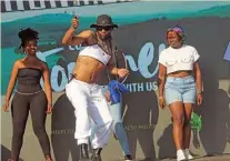  ?? ?? HOW IT’S DONE: Sho Madjozi’s choreograp­her showing his moves