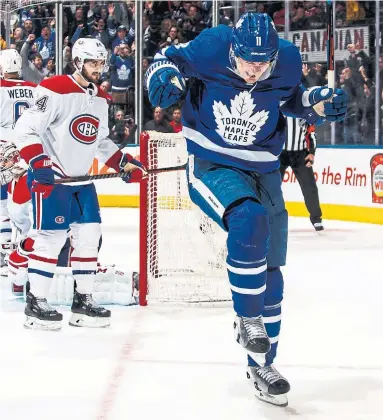  ?? MARK BLINCH GETTY IMAGES ?? Toronto’s Zach Hyman celebrates his third-period goal against the Canadiens on Saturday, part of a huge comeback win.