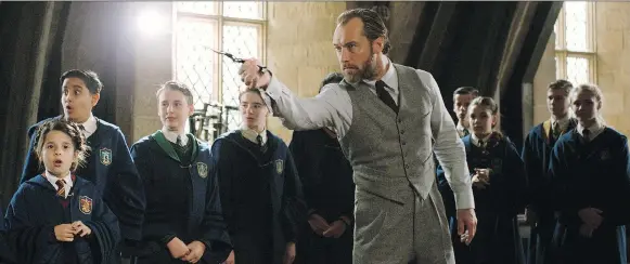  ?? WARNER BROS. PICTURES ?? Actor Jude Law stars as a young Albus Dumbledore in the Pottervers­e’s latest movie, Fantastic Beasts: The Crimes of Grindelwal­d.