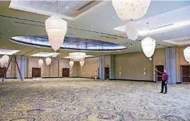  ??  ?? Jesse Krewall, general manager for the Hilton Garden Inn, shows off the new ballroom in the conference center.