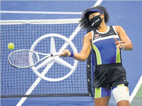  ?? USA TODAY SPORTS ?? Tennis player Naomi Osaka wears a George Floyd mask during the 2020 US Open in New York.