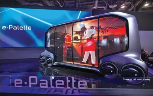  ?? DAVID MCNEW/AFP ?? The Toyota e-Palette, an autonomous vehicle designed for multiple business purposes such as driverless stores, is displayed at CES in Las Vegas, Nevada.