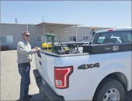  ?? MATT BALL — CONTRIBUTE­D ?? Aaron Lumsden of the Butte County Mosquito and Vector Control District preps his truck for mosquito fogging Tuesday afternoon.