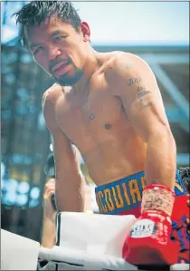  ?? Picture: AFP ?? HAVE ANOTHER LOOK: Manny Pacquiao reacts after losing to Jeff Horn of Australia in their WBO welterweig­ht clash in Brisbane. Pacquiao has called on authoritie­s to review the outcome of the fight