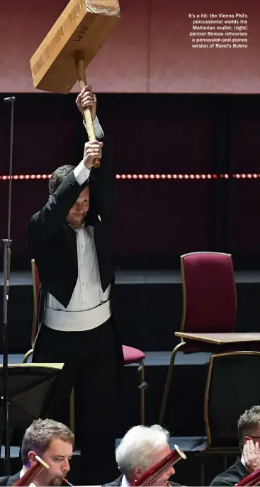  ??  ?? It’s a hit: the Vienna Phil’s percussion­ist wields the Mahlerian mallet; (right) Jamixel Bereau rehearses a percussion-and-pianos version of Ravel’s Boléro