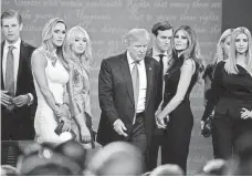  ?? ROBERT HANASHIRO, USA TODAY ?? Republican presidenti­al nominee Donald Trump and his family after Wednesday’s presidenti­al debate in Las Vegas.