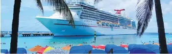  ??  ?? Carnival Cruise Line's Carnival Pride in picturesqu­e Grand Turk, Turks and Caicos.