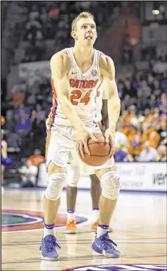  ?? RON IRBY / ASSOCIATED PRESS ?? Canyon Barry has made 90 percent of his underhand freethrow tries as a Gator. His dad, Hall of Famer Rick Barry, made 89.3 percent of free throws.