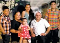  ?? COURTESY OF ADVOCATES FOR BASIC LEGAL EQUALITY ?? Maribel Trujillo Diaz appears in a family photograph with her four children and husband.