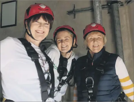  ?? ?? ADRENALINE-FUELLED Margaret, Lynda and Ella at their Spinnaker Tower abseil