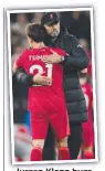  ?? ?? Jurgen Kl Klopp h hugs Kostas Tsimikas.