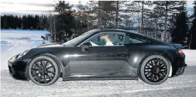  ??  ?? Top left: The camouflage on the 2019 911 gives little way with the major changes beneath the skin. Top: The new Cayenne will get a clamshell bonnet similar to the Macan. Above: Do not expect major changes to the 911’s iconic side profile.