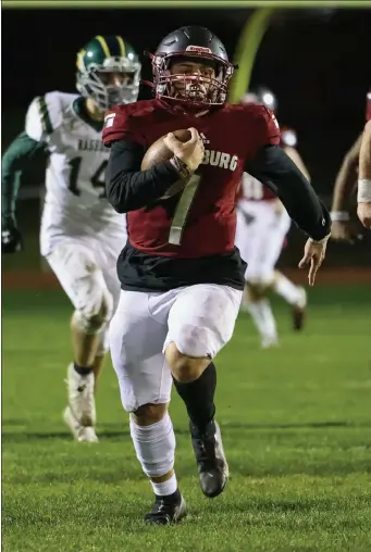  ?? GARY FOURNIER / SENTINEL & ENTERPRISE ?? Fitchburg's Anthony Oquendo breaks away on a touchdown run during Friday's game against Nashoba Regional.