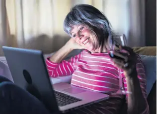  ?? PHOTO: GETTY IMAGES ?? Evening relaxation . . . The five o’clock wine has gone online during lockdown, but that’s not necessaril­y a bad thing.