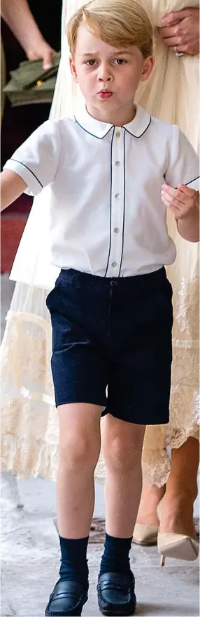  ??  ?? Shorts chic: Prince George at the christenin­g of his brother, Louis