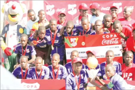  ??  ?? A SCHOOL ON A MISSION . . . Rujeko High School celebratin­g their Copa Coca-Cola victory in Gwanda last year, believe they can repeat the act in Bindura at this year’s tournament that starts today