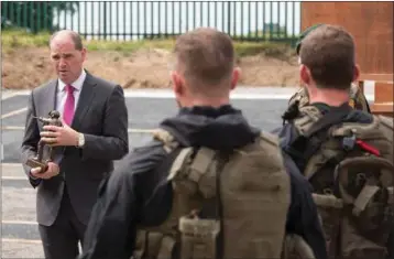  ??  ?? Minister Paul Kehoe meets members of the Army Ranger Wing at the Curragh Camp.