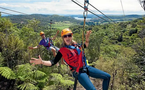  ??  ?? Bond over a zip-line adventure with a view.