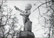  ?? BRIAN VAN DER BRUG/TRIBUNE NEWSPAPERS ?? Vulcan stands tall on Red Mountain above Birmingham, Ala. He was once used to signal daily traffic deaths.