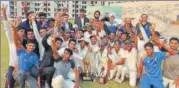  ??  ?? REPL Crusaders team players pose with under19 cricket trophy in ▪
Lucknow on Monday.