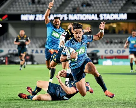  ?? PHOTOSPORT ?? Rieko Ioane is already celebratin­g as he prepares to score his second try in the Blues’ win over the Highlander­s in Auckland last night.