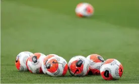  ?? Photograph: Matthew Childs/Action Images via Reuters ?? Match balls on the pitch before Southampto­n’s meeting with Aston Villa on 22 February before the coronaviru­s crisis caused sport to shut down.