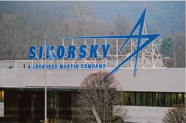  ?? Christian Abraham/Hearst Connecticu­t Media file photo ?? On the heels of the U.S. Army scrapping plans for an armed scout helicopter, Sikorsky is laying off as many as 400 workers in Connecticu­t.