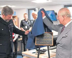  ?? Picture: PA. ?? The Prince of Wales, right, at King’s Lynn police station.