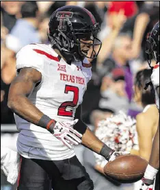  ?? RONALD MARTINEZ / GETTY IMAGES ?? Receiver Reginald Davis finished last season at Texas Tech with 15 receptions for 247 yards, two touchdowns and 14 kickoff returns.