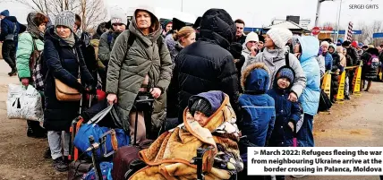  ?? SERGEI GRITS ?? March 2022: Refugees fleeing the war from neighbouri­ng Ukraine arrive at the border crossing in Palanca, Moldova